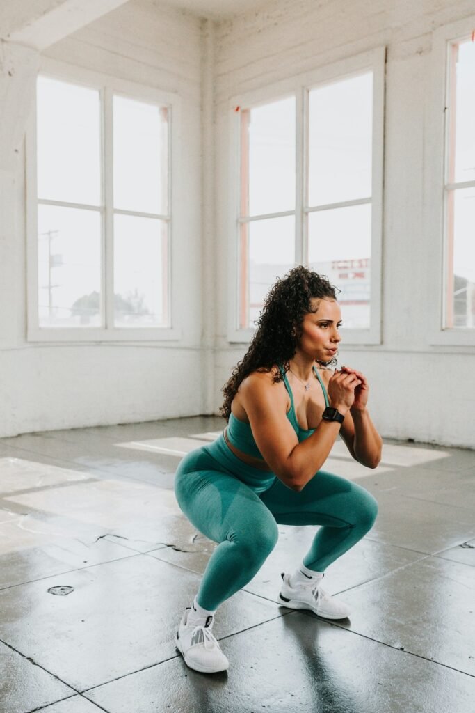 Woman doing a squat in the gym